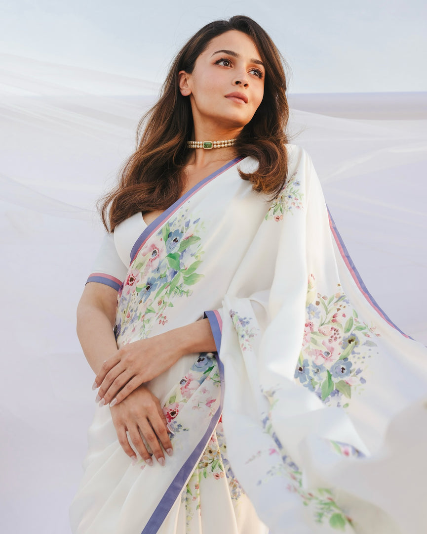 Elegant Floral White Saree with Blue and Pink Border